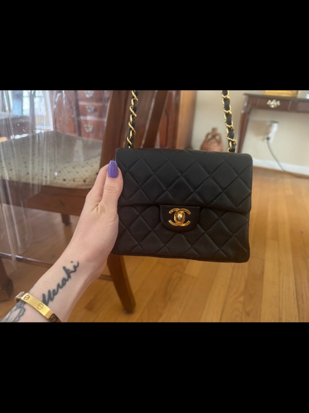 CHANEL Black Quilted Mini Flap Bag with Gold Chain